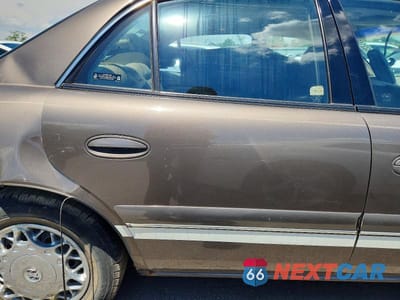 Zdjęcie 10 z 13 samochodu: 2002 BUICK CENTURY LIMITED VIN:2G4WY55J021168483 - miniatura