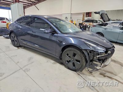 Czwarte zdjęcie samochodu z boku: 2021 TESLA MODEL 3 VIN:5YJ3E1EA7MF098134 - miniatura