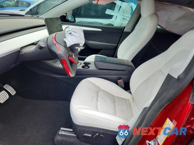 Zdjęcie 7 z 12 samochodu: 2024 TESLA MODEL Y VIN:7SAYGDEF2RA265519 - miniatura