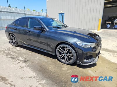 Czwarte zdjęcie samochodu z boku: 2020 BMW M340I VIN:3MW5U7J02L8B23386 - miniatura