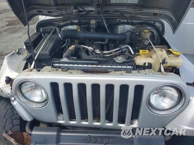 Zdjęcie 11 z 12 samochodu: 2003 JEEP WRANGLER COMMANDO VIN:1J4FA39S53P363364 - miniatura