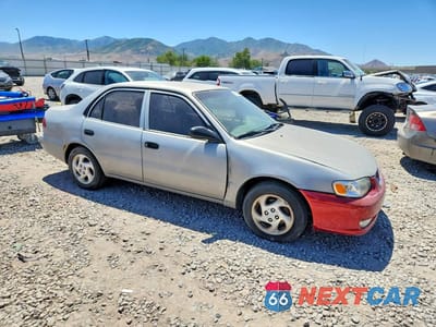 Czwarte zdjęcie samochodu z boku: 2002 TOYOTA COROLLA CE VIN:2T1BR12E12C565654 - miniatura