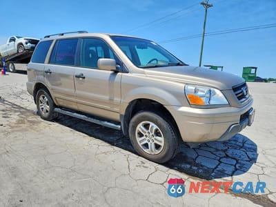 Czwarte zdjęcie samochodu z boku: 2003 HONDA PILOT EX VIN:2HKYF18433H566241 - miniatura