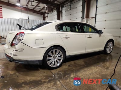 Trzecie zdjęcie samochodu z tyłu: 2014 LINCOLN MKS VIN:1LNHL9FT5EG612656 - miniatura
