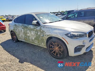 Czwarte zdjęcie samochodu z boku: 2016 BMW X6 M VIN:5YMKW8C56G0R43752 - miniatura