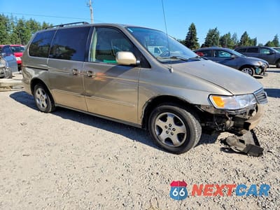 Czwarte zdjęcie samochodu z boku: 2000 HONDA ODYSSEY EX VIN:2HKRL1866YH601361 - miniatura