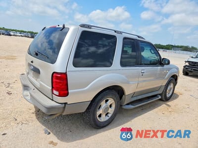 Trzecie zdjęcie samochodu z tyłu: 2003 FORD EXPLORER SPORT VIN:1FMYU60EX3UA95391 - miniatura