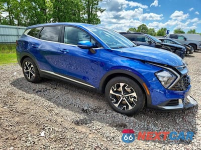 Czwarte zdjęcie samochodu z boku: 2023 KIA SPORTAGE EX VIN:5XYK33AF2PG100559 - miniatura