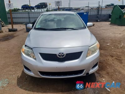 Piąte zdjęcie samochodu w środku: 2010 TOYOTA COROLLA LE VIN:2T1BU4EE0AC196439 - miniatura
