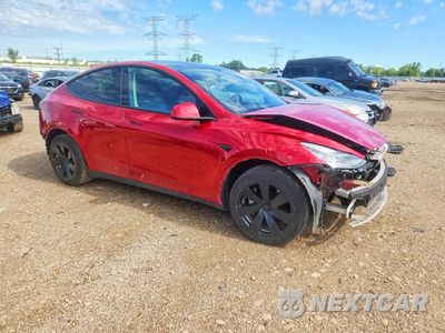 Czwarte zdjęcie samochodu z boku: 2022 TESLA MODEL Y VIN:7SAYGAEE3NF364823 - miniatura