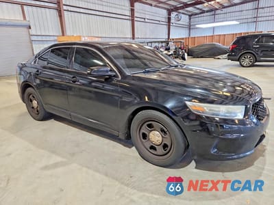 Czwarte zdjęcie samochodu z boku: 2015 FORD TAURUS POLICE INTERCEPTOR VIN:1FAHP2L88FG154134 - miniatura