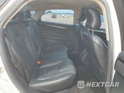 Zdjęcie 10 z 12 samochodu: 2017 FORD FUSION TITANIUM VIN:3FA6P0K91HR130503 - miniatura