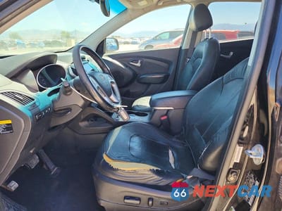 Zdjęcie 7 z 12 samochodu: 2013 HYUNDAI TUCSON LIMITED VIN:KM8JUCAC7DU581428 - miniatura