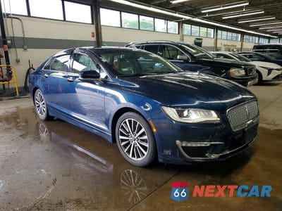 Czwarte zdjęcie samochodu z boku: 2017 LINCOLN MKZ PREMIERE VIN:3LN6L5A98HR647961 - miniatura