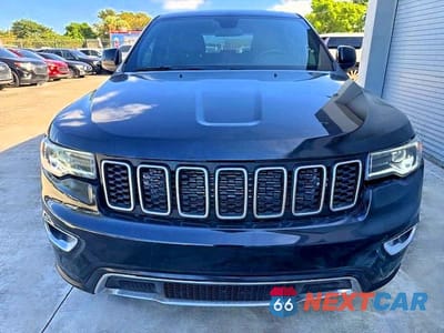 Piąte zdjęcie samochodu w środku: 2021 JEEP GRAND CHEROKEE LAREDO VIN:1C4RJEAGXMC657311 - miniatura