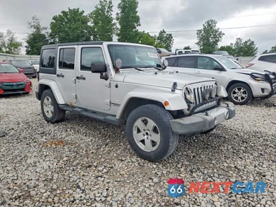 Czwarte zdjęcie samochodu z boku: 2012 JEEP WRANGLER UNLIMITED SAHARA VIN:1C4BJWEG7CL150012 - miniatura