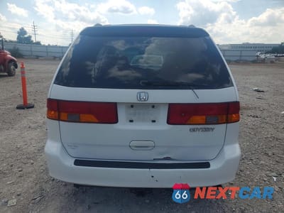 Zdjęcie 6 z 13 samochodu: 2004 HONDA ODYSSEY EXL VIN:5FNRL18974B064051 - miniatura