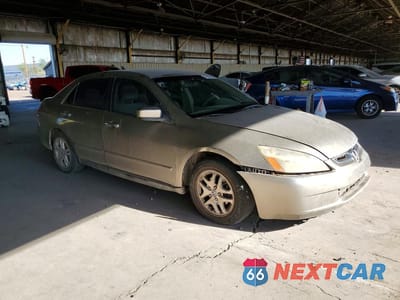Czwarte zdjęcie samochodu z boku: 2003 HONDA ACCORD LX VIN:JHMCM56353C007902 - miniatura
