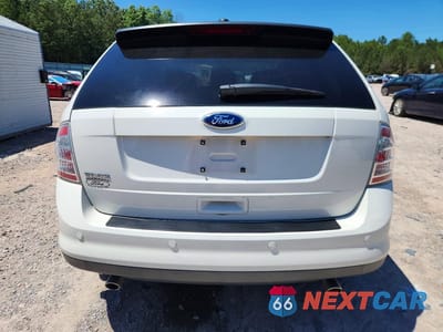 Zdjęcie 6 z 13 samochodu: 2010 FORD EDGE SE VIN:2FMDK3GC5ABB50677 - miniatura