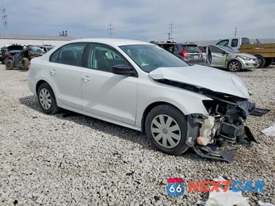 Czwarte zdjęcie samochodu z boku: 2016 VOLKSWAGEN JETTA S VIN:3VW267AJ9GM364297 - miniatura