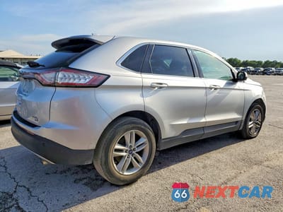 Trzecie zdjęcie samochodu z tyłu: 2018 FORD EDGE SEL VIN:2FMPK4J82JBB28403 - miniatura