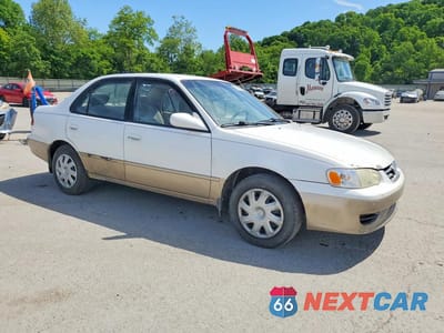 Czwarte zdjęcie samochodu z boku: 2002 TOYOTA COROLLA LE VIN:1NXBR12E12Z584221 - miniatura
