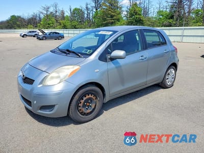 2009 TOYOTA YARIS BASE JTDKT903495248878 - główne zdjęcie licytacji z USA - miniatura