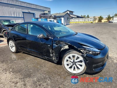 Czwarte zdjęcie samochodu z boku: 2022 TESLA MODEL 3 VIN:5YJ3E1EA4NF286594 - miniatura