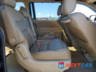 Zdjęcie 11 z 13 samochodu: 2009 HONDA ODYSSEY EXL VIN:5FNRL38729B055002 - miniatura