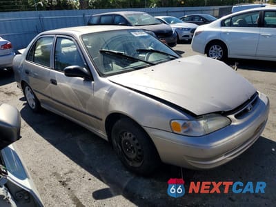 Czwarte zdjęcie samochodu z boku: 1999 TOYOTA COROLLA VE VIN:1NXBR12E9XZ185273 - miniatura