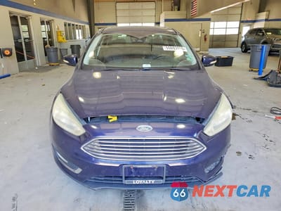 Piąte zdjęcie samochodu w środku: 2016 FORD FOCUS TITANIUM VIN:1FADP3J26GL335759 - miniatura