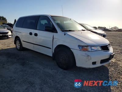 Czwarte zdjęcie samochodu z boku: 2000 HONDA ODYSSEY LX VIN:2HKRL1855YH585659 - miniatura