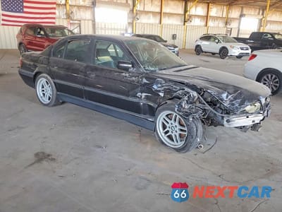Czwarte zdjęcie samochodu z boku: 2000 BMW 740 I AUTOMATIC VIN:WBAGG8342YDN80439 - miniatura