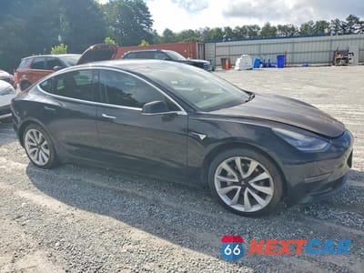 Czwarte zdjęcie samochodu z boku: 2020 TESLA MODEL 3 VIN:5YJ3E1EA0LF660776 - miniatura