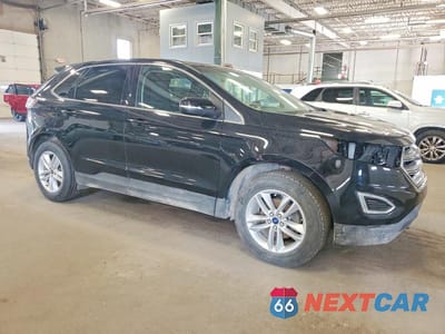 Czwarte zdjęcie samochodu z boku: 2018 FORD EDGE VIN:2FMPK3J90JBC40782 - miniatura