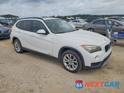 Czwarte zdjęcie samochodu z boku: 2014 BMW X1 XDRIVE28I VIN:WBAVL1C50EVY20659 - miniatura