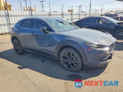 Czwarte zdjęcie samochodu z boku: 2022 MAZDA CX-30 PREMIUM VIN:3MVDMBDY8NM448085 - miniatura