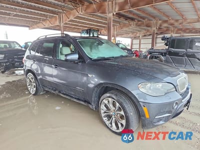Czwarte zdjęcie samochodu z boku: 2012 BMW X5 XDRIVE35D VIN:5UXZW0C57CL664438 - miniatura