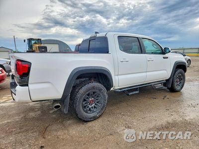 Trzecie zdjęcie samochodu z tyłu: 2019 TOYOTA TACOMA TRD PRO VIN:5TFCZ5AN1KX209736 - miniatura