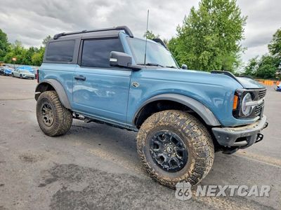 Czwarte zdjęcie samochodu z boku: 2022 FORD BRONCO BASE VIN:1FMDE5CP7NLB35356 - miniatura
