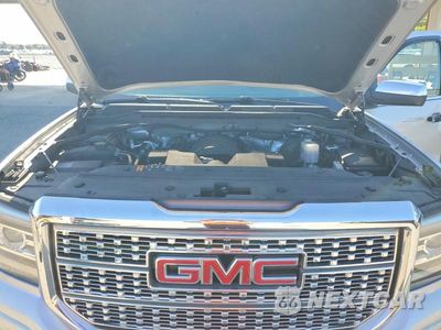 Zdjęcie 11 z 12 samochodu: 2017 GMC SIERRA K1500 DENALI VIN:3GTU2PECXHG449765 - miniatura
