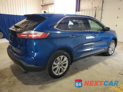 Trzecie zdjęcie samochodu z tyłu: 2023 FORD EDGE TITANIUM VIN:2FMPK4K93PBA44686 - miniatura