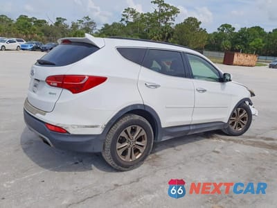 Trzecie zdjęcie samochodu z tyłu: 2013 HYUNDAI SANTA FE SPORT 2.4L VIN:5XYZU3LB9DG101080 - miniatura