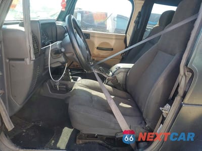 Zdjęcie 7 z 12 samochodu: 2003 JEEP WRANGLER COMMANDO VIN:1J4FA39S33P323221 - miniatura