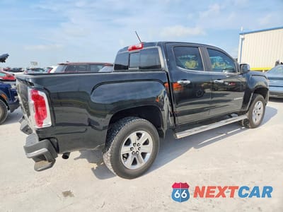 Trzecie zdjęcie samochodu z tyłu: 2017 GMC CANYON SLT VIN:1GTG5DEN6H1283635 - miniatura