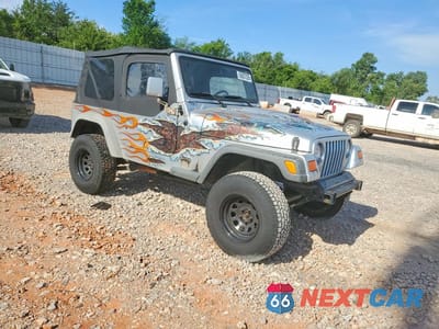 Czwarte zdjęcie samochodu z boku: 1997 JEEP WRANGLER / TJ SPORT VIN:1J4FY19S6VP425115 - miniatura