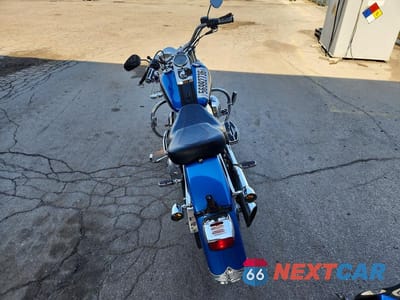Czwarte zdjęcie samochodu z boku: 2004 HARLEY-DAVIDSON FLSTFI VIN:1HD1BXB184Y037722 - miniatura