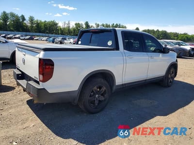 Trzecie zdjęcie samochodu z tyłu: 2021 HONDA RIDGELINE BLACK EDITION VIN:5FPYK3F85MB008668 - miniatura