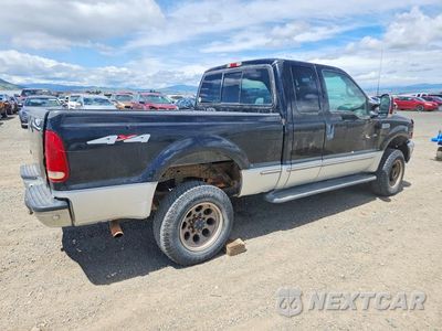 Trzecie zdjęcie samochodu z tyłu: 1999 FORD F250 SUPER DUTY VIN:1FTNX21S1XEA23345 - miniatura