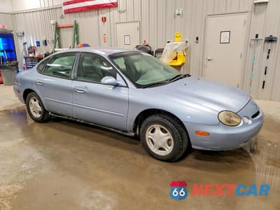 Czwarte zdjęcie samochodu z boku: 1997 FORD TAURUS GL VIN:1FALP52U3VG315384 - miniatura
